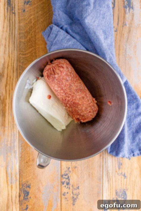 Cream Cheese Sausage Poppers 10 cream cheese and sausage int he bottom of a stand mixer.