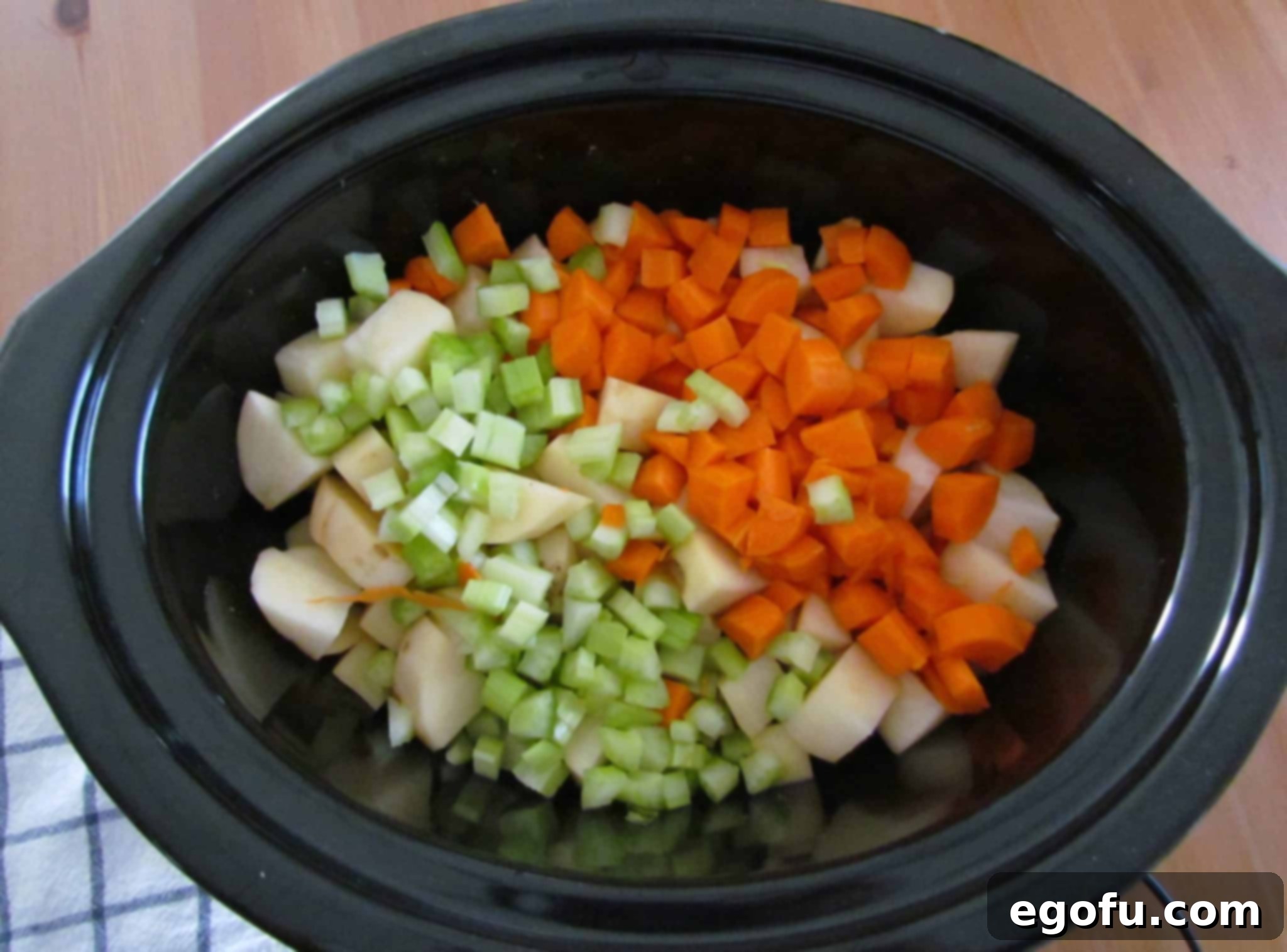 diced potatoes, diced celery, diced carrots, sliced leeks and cooked bacon.