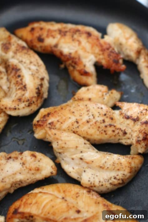 Browned chicken tenderloins in a large skillet.