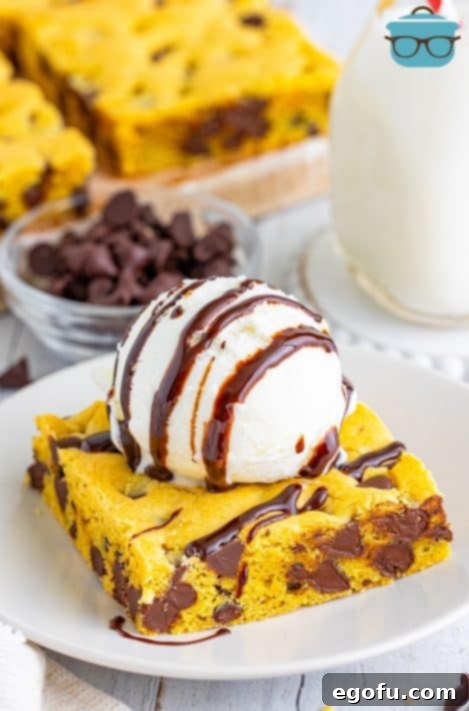 A Lazy Chocolate Chip Cookie Bar with ice cream and chocolate sauce.
