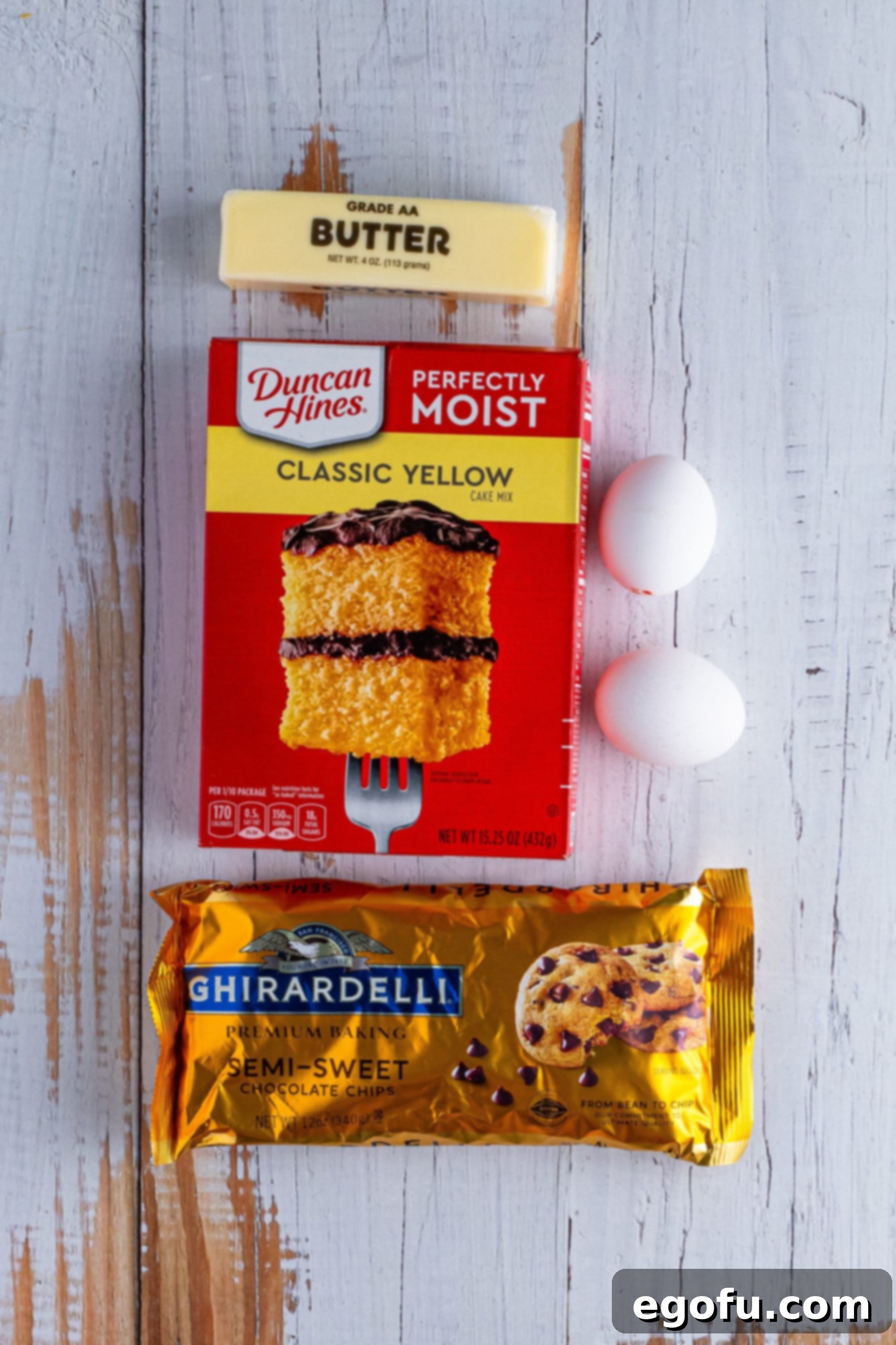 Yellow cake mix, chocolate chips, eggs, and butter.