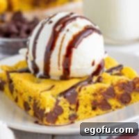 Close up looking at a plate with a Lazy Chocolate Chip Cookie Bar.