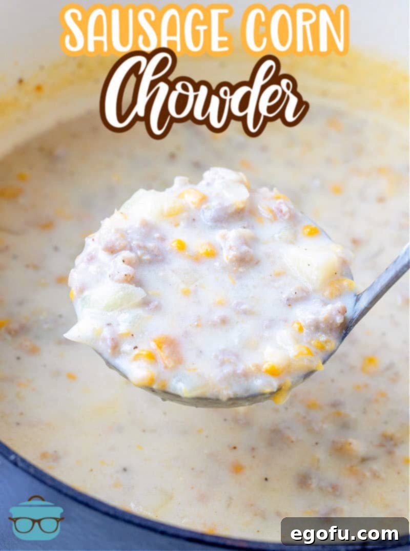 Sausage Corn Chowder recipe from The Country Cook. A ladle full of sausage corn chowder is showing scooping out some of the soup from a dutch oven, highlighting its creamy texture and hearty ingredients.