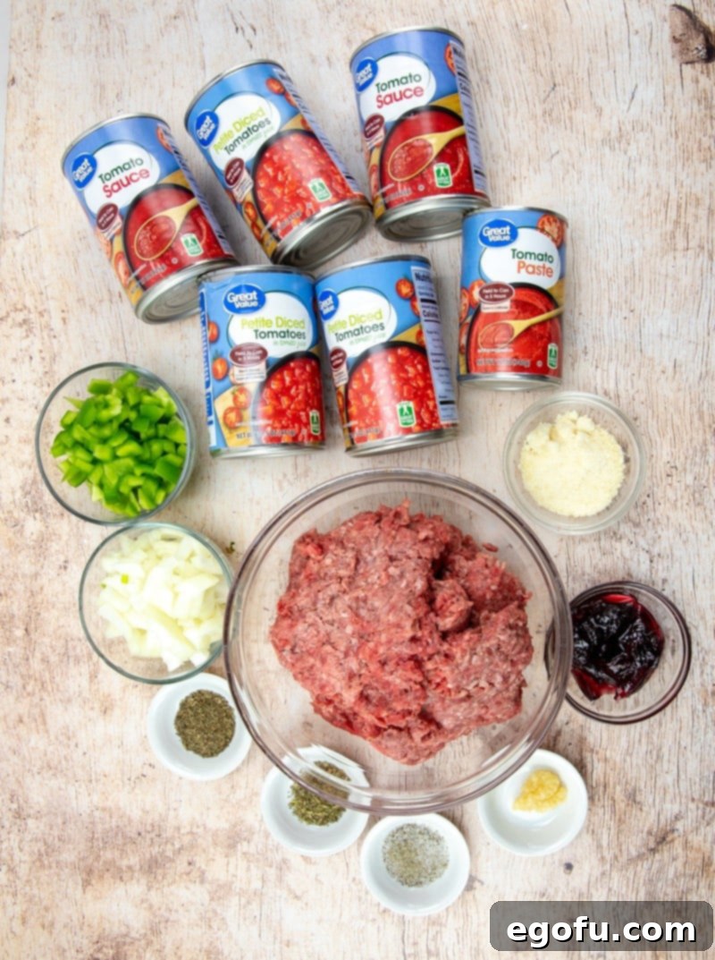 ground beef, garlic, onion, green pepper, grape jelly, tomato sauce, parmesan cheese, basil, Italian Seasoning, diced tomatoes. 