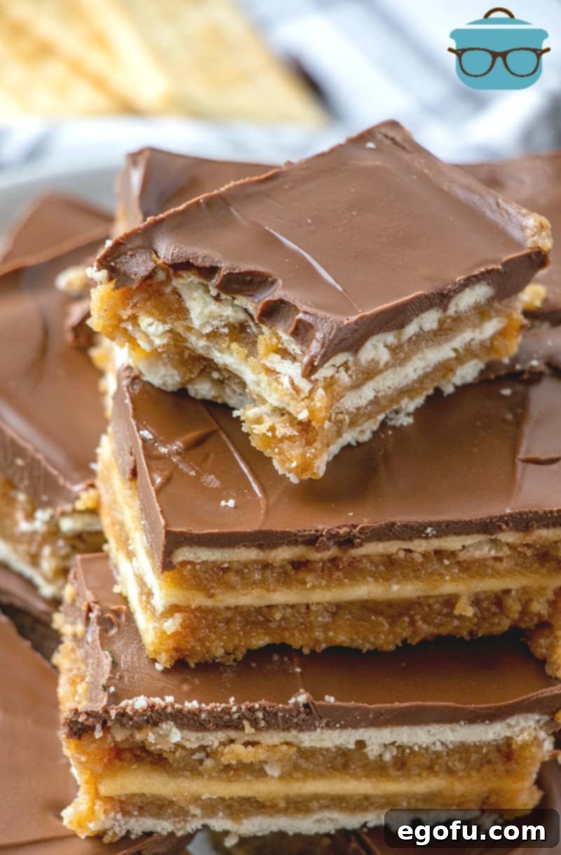 Homemade Kit Kat Bars stacked on top of each other, bit taken out of one of the bars.