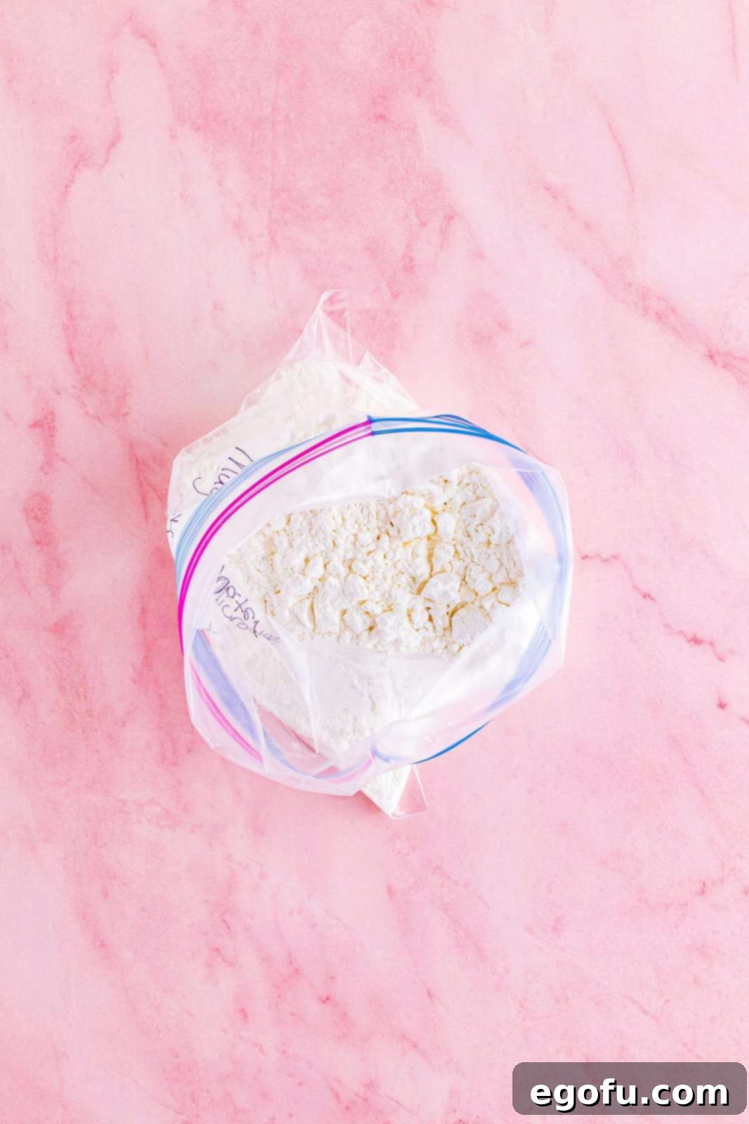 Angel food cake mix combined with confetti cake mix in a large Ziploc bag.