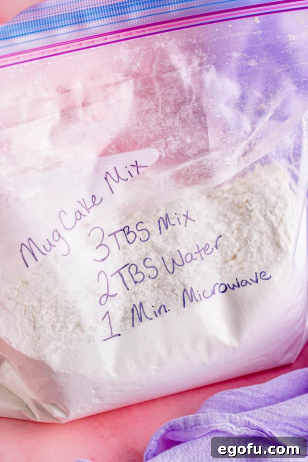 Cake mixes in a Ziploc bag with written instructions for making the mug cake.