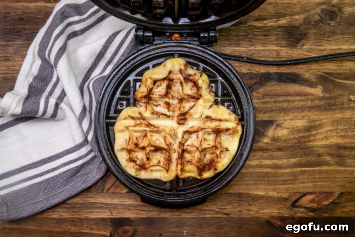 pressed and baked cinnamon rolls inside a waffle maker. 