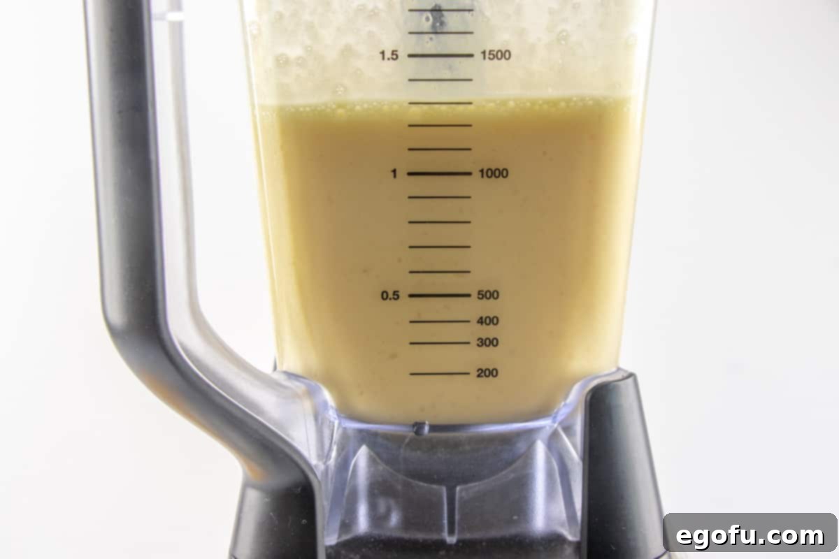 The Best Homemade Orange Julius 6 Finished Orange Julius in a blender.