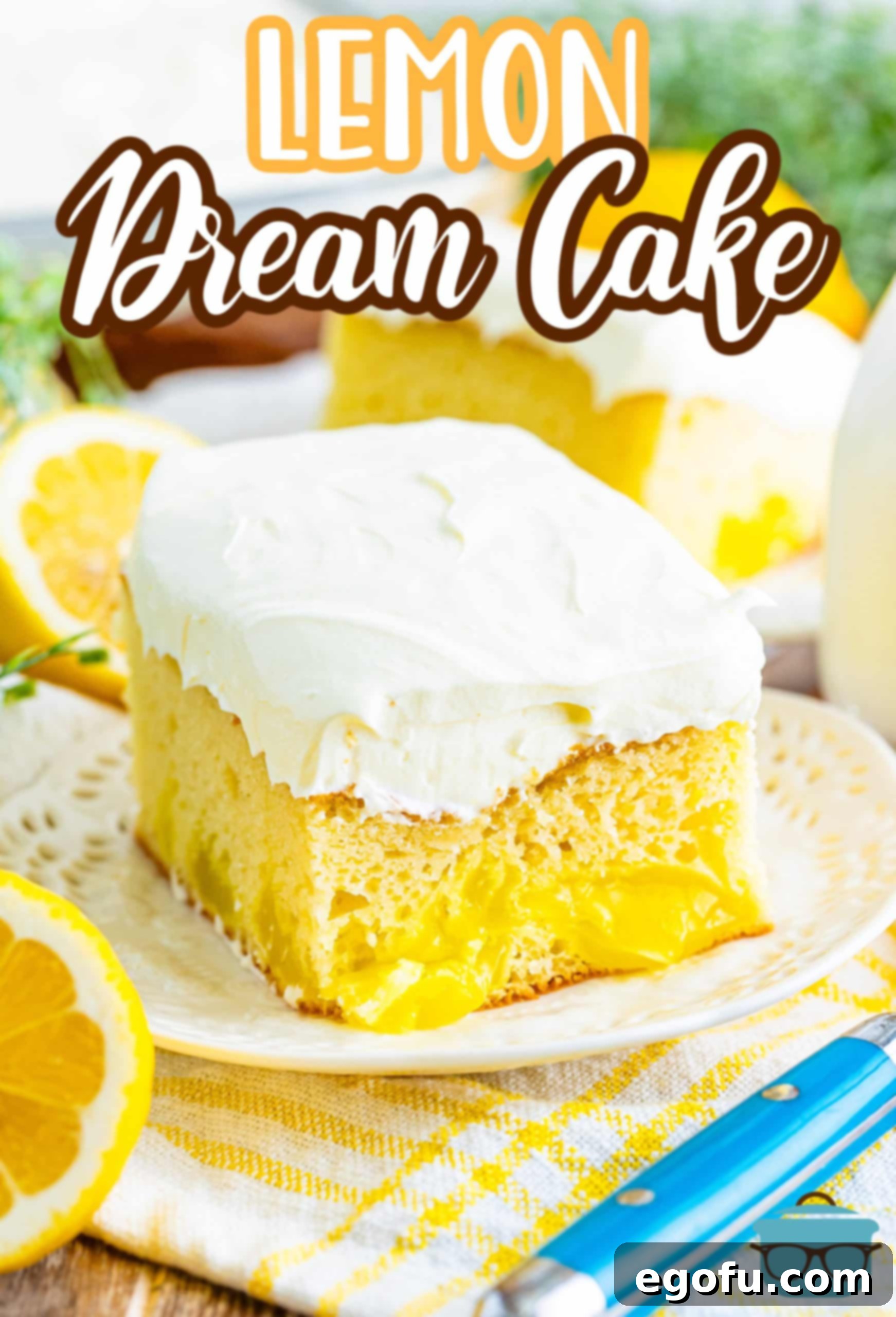 A beautifully presented plate holding a generous serving of homemade Lemon Dream Cake, topped with a light, fluffy layer of whipped cream, ready to be enjoyed.