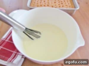 whisking together milk and instant pudding.