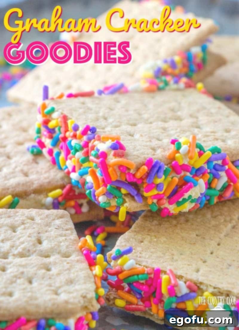 No-Bake Graham Cracker Goodies recipe, stacked high with creamy filling and vibrant sprinkles, a truly easy dessert.