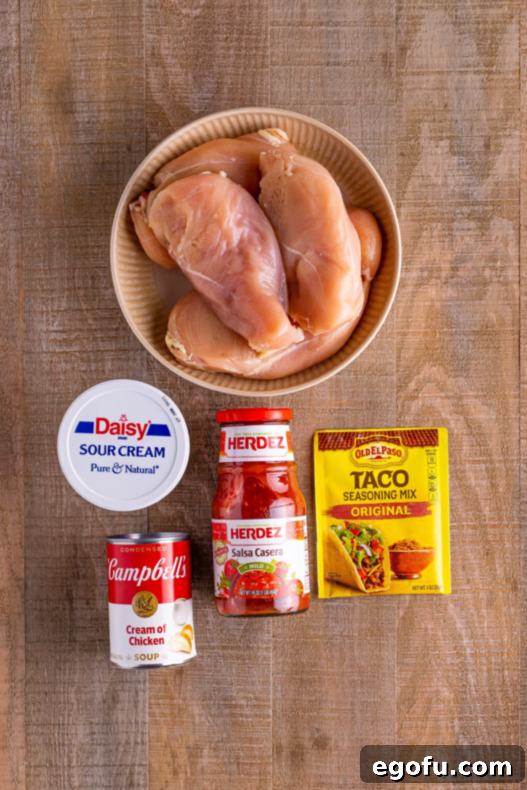 Effortless Slow Cooker Taco Chicken 4 Chicken breasts, sour cream taco seasoning, cream of chicken soup, and salsa.