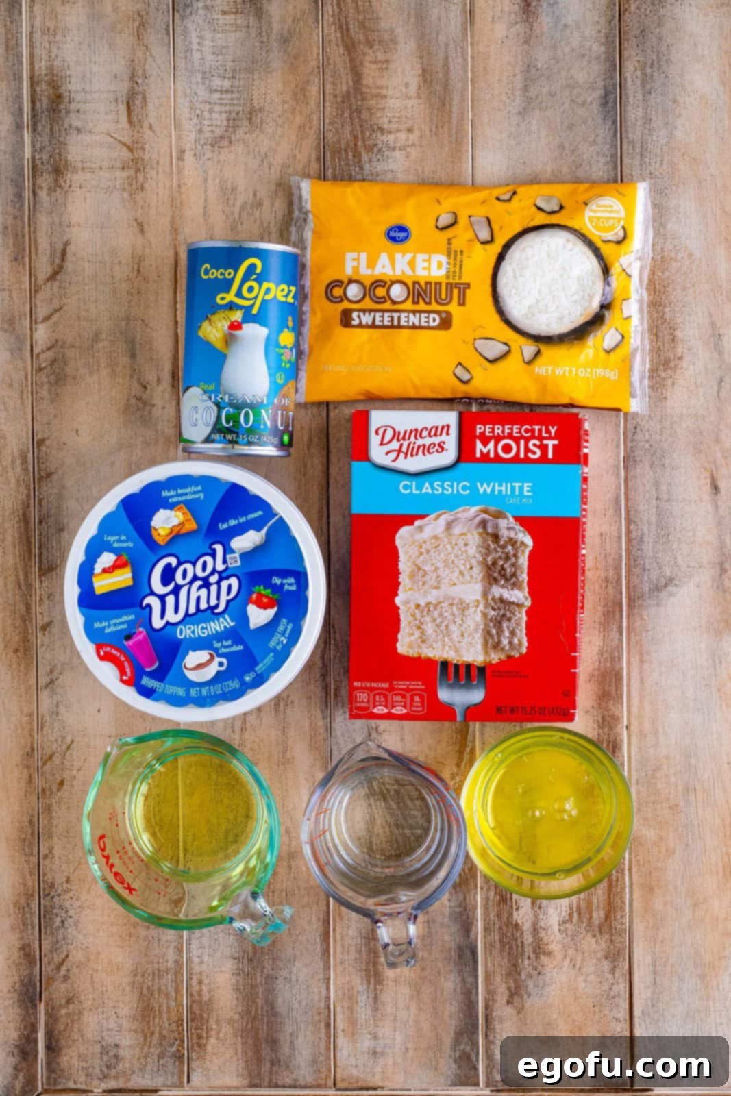 white cake mix, coconut flakes, Cool Whip, cream of coconut.