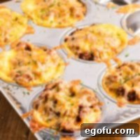 Smoky Beef Biscuit Pockets 10 A muffin tin showing cooked BBQ Beef Biscuits cups.