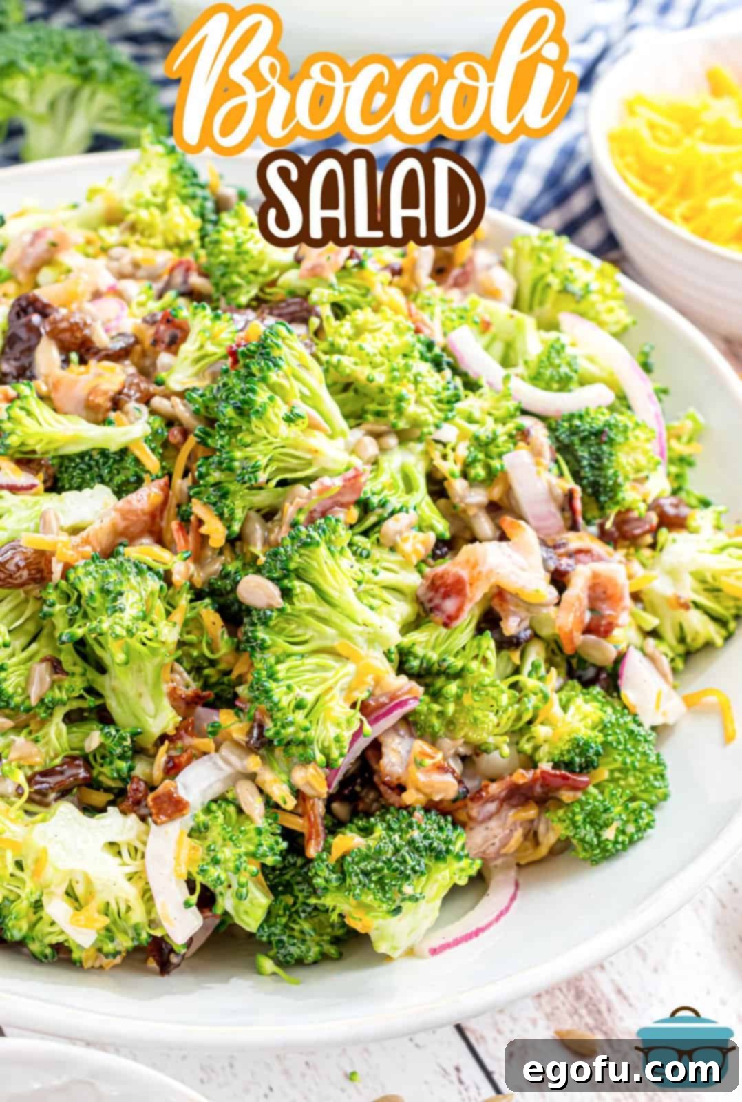 A serving of broccoli salad presented in a shallow white bowl on a rustic wooden surface, highlighting its vibrant colors.