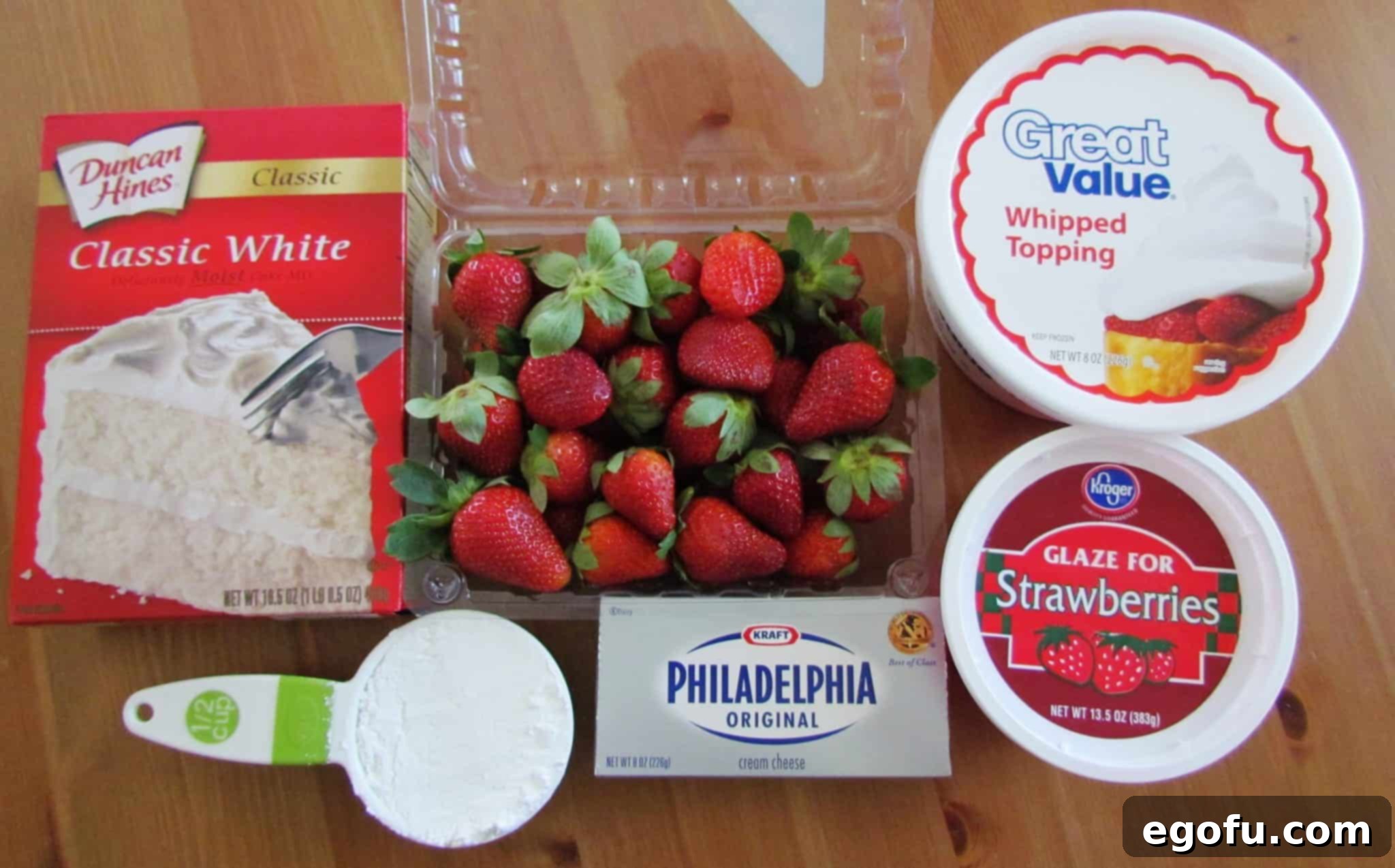 boxed white cake mix, fresh strawberries, Cool Whip, cream cheese, powdered sugar, strawberry glaze.