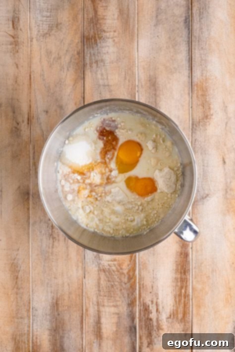 Swirl of Spice Cake 17 All cake ingredients are shown combined within a stand mixer bowl, ready for the next step.