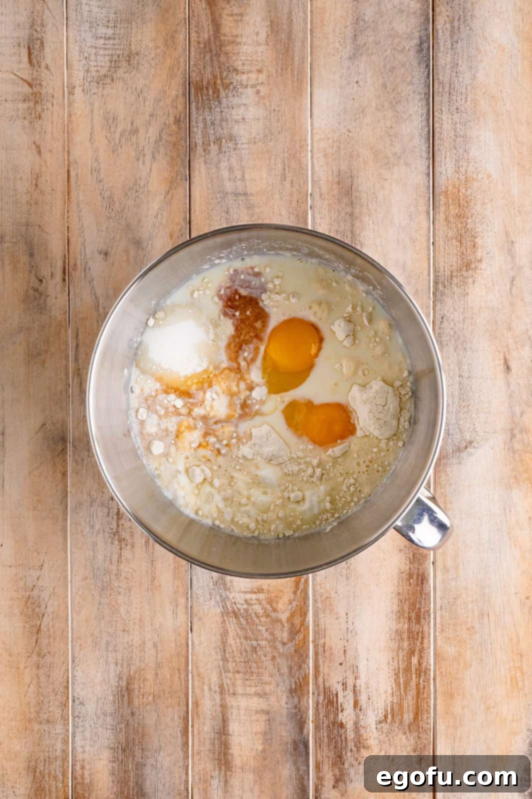 Swirl of Spice Cake 5 All cake ingredients are shown combined within a stand mixer bowl, ready for the next step.