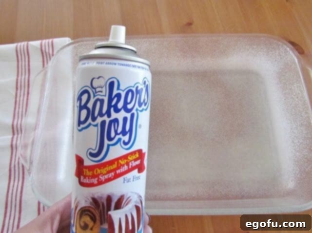 A can of Baker's Joy nonstick cooking spray with flour, a trusted tool for preventing cakes from sticking to intricate pans.