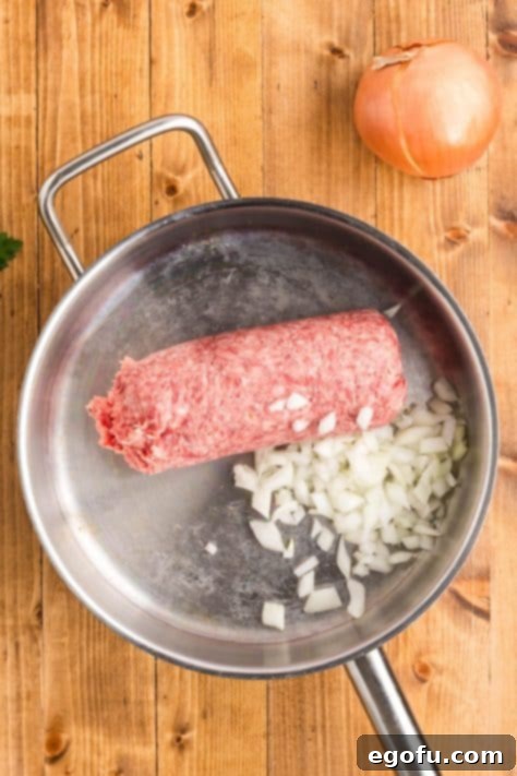 ground beef and onion in a skillet.