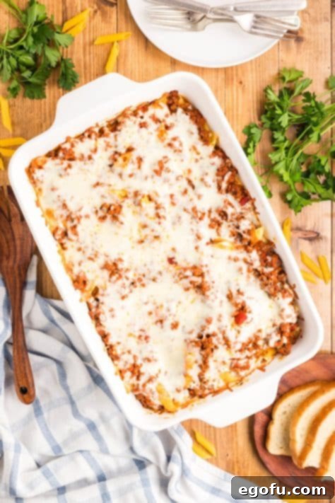 fully baked baked ziti in baking dish.