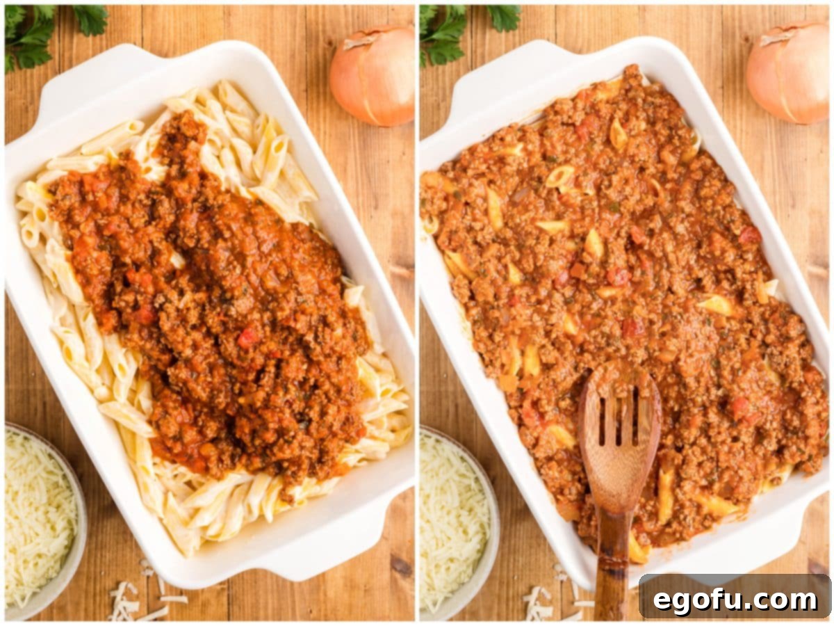 A collage of two images: the first depicts the spaghetti sauce mixture being poured over the alfredo pasta layer in the baking dish, and the second shows a wooden spoon being used to evenly spread the sauce.