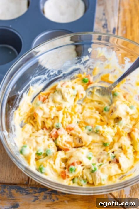 A bowl with the filling for Chicken Pot Pies.