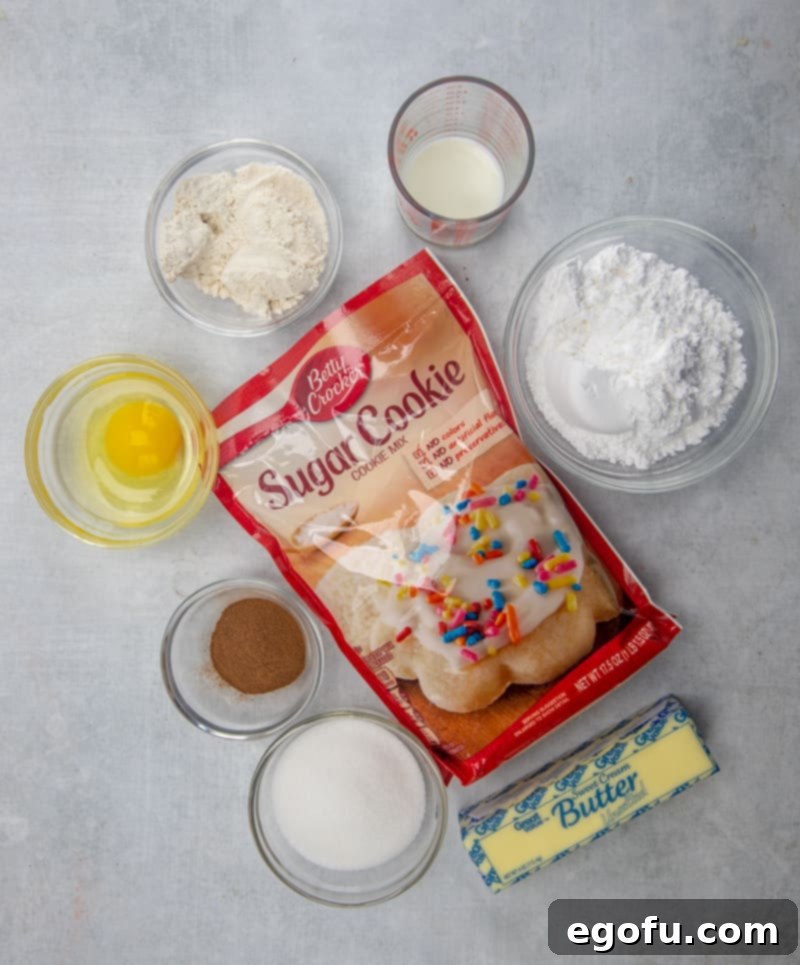Collection of ingredients: sugar cookie mix, butter or margarine, all-purpose flour, egg, granulated sugar, ground cinnamon, powdered sugar, milk.