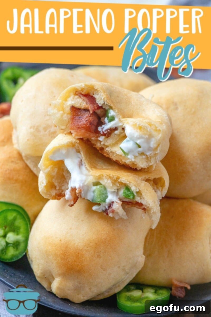 Zesty Jalapeño Delights 3 Close-up of a Jalapeño Popper Bite, split open to reveal the rich, creamy cream cheese and bacon filling, hinting at its deliciousness.