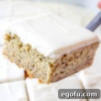 Thumbnail image of a slice of banana cake with frosting.