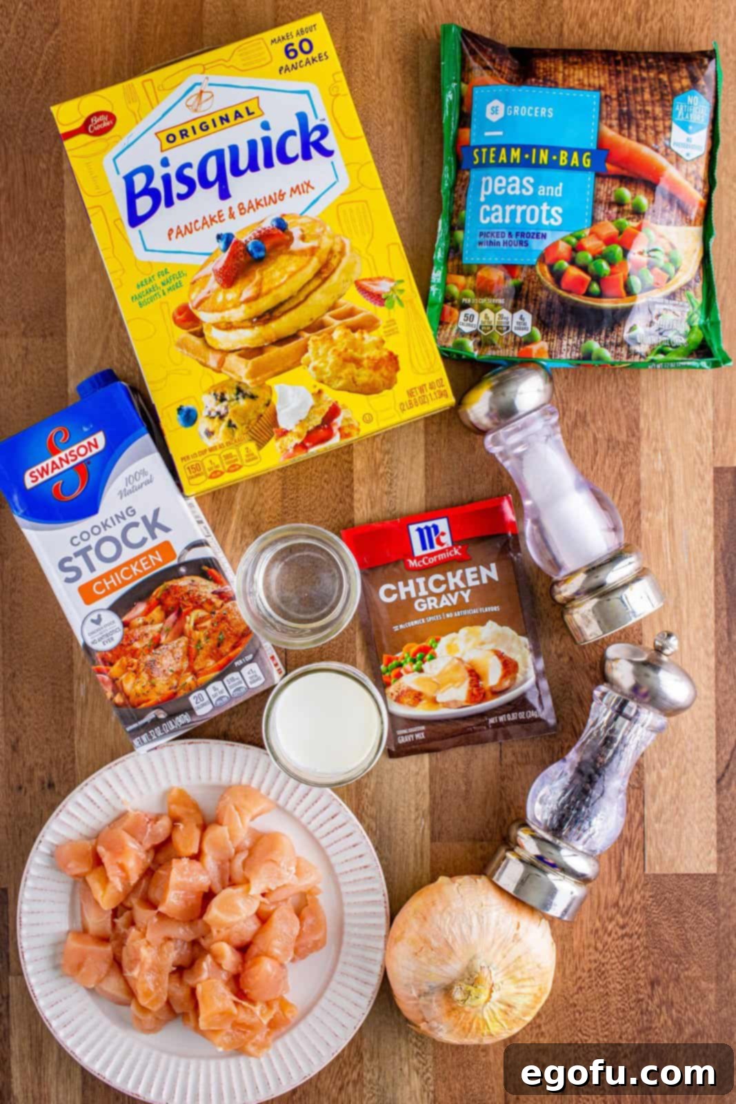 Bisquick, chicken stock, peas and carrots, chicken gravy mix, milk, chicken tenders, onion and seasonings. 