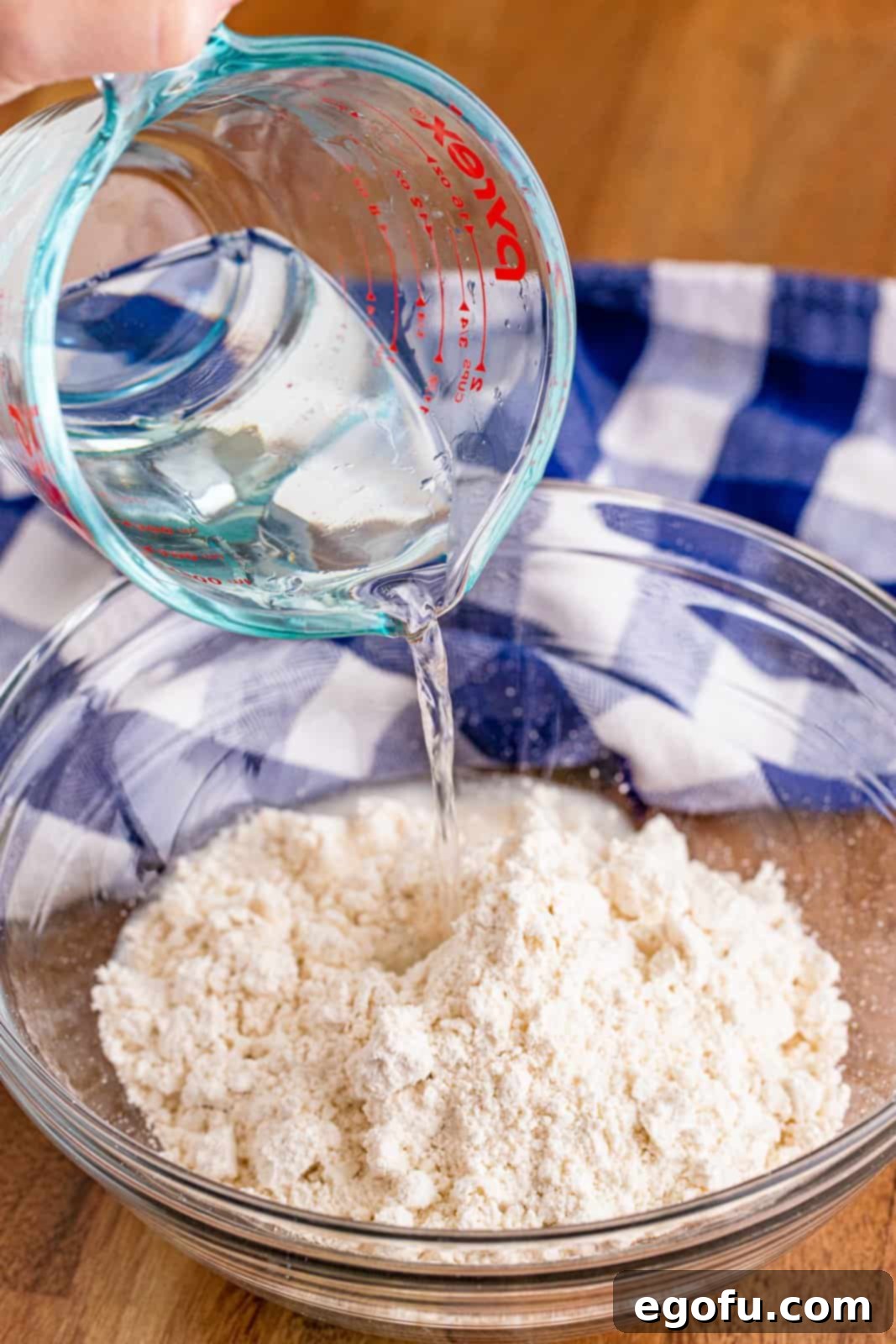 Bisquick and water mix together in a large bowl. 
