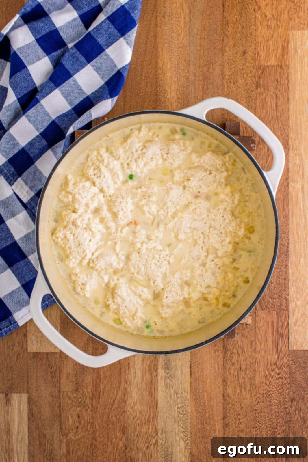 Bisquick dumpling dough added to pot. 