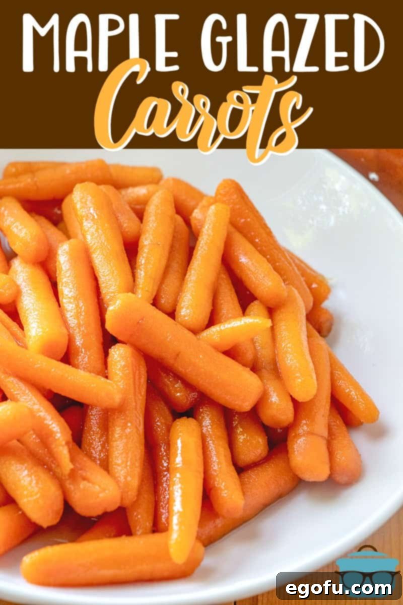 Maple Kissed Carrots 3 A vibrant close-up of the easy Maple Glazed Carrots recipe, showcasing their beautiful, thick glaze and rich orange color in a wide white serving bowl, perfect for a family meal.