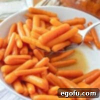 Maple Kissed Carrots 7 Maple Glazed Carrots, garnished and served, ready for tasting.