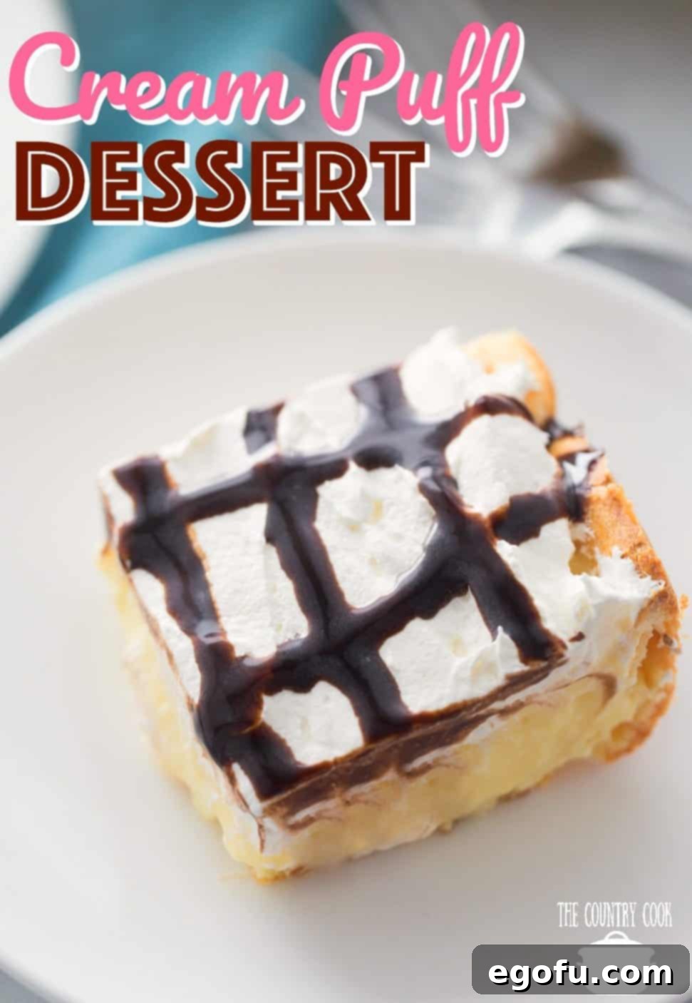 Easy Cream Puff Dessert recipe, a closeup of a delicious slice on a plate with chocolate syrup.