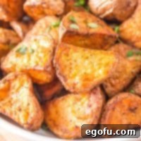 Close up square image of Air Fryer Roasted Red Potatoes in bowl, ready to serve.