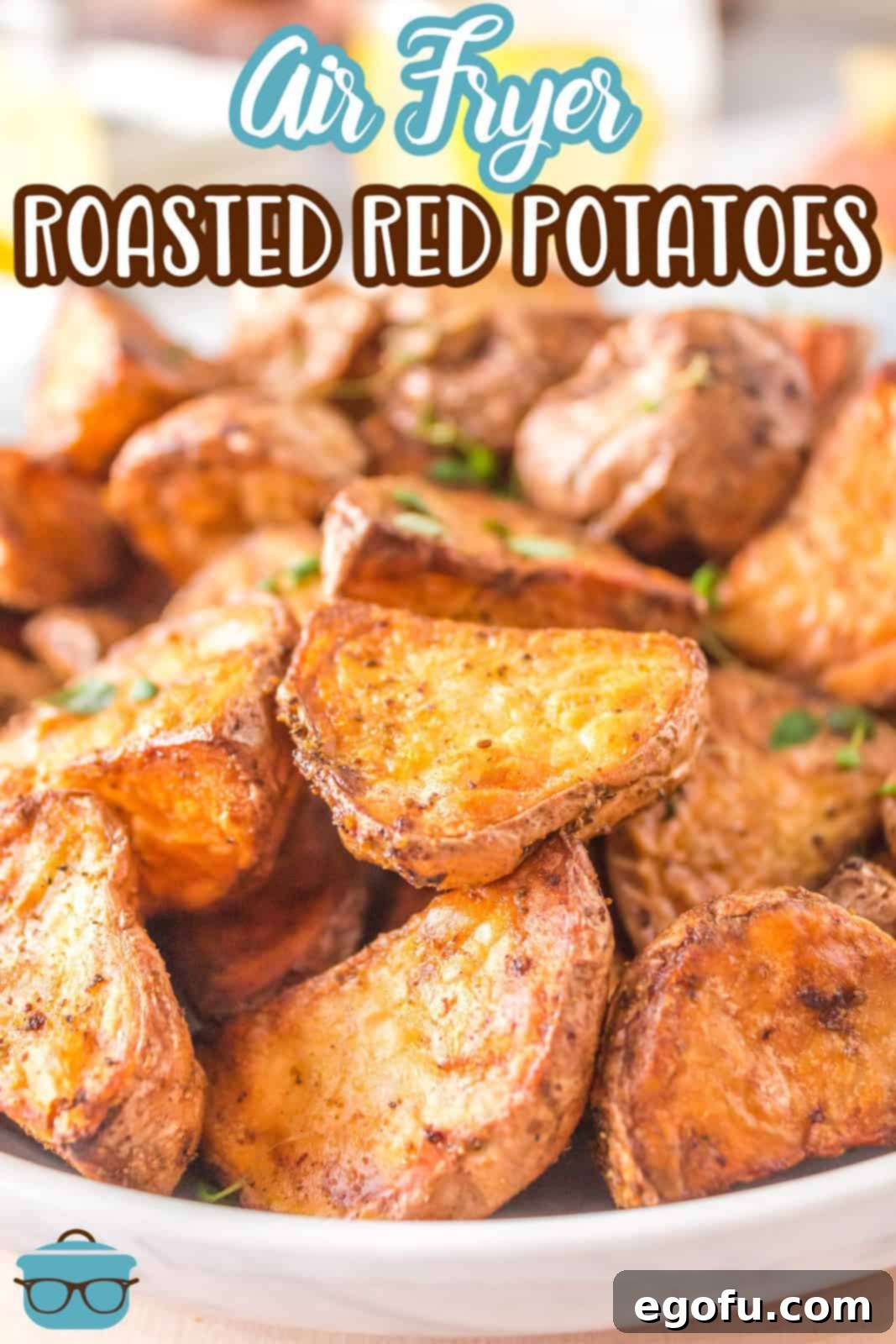 Pinterest image showcasing a close-up of crispy golden Air Fryer Roasted Red Potatoes in a serving bowl, ready to be enjoyed.