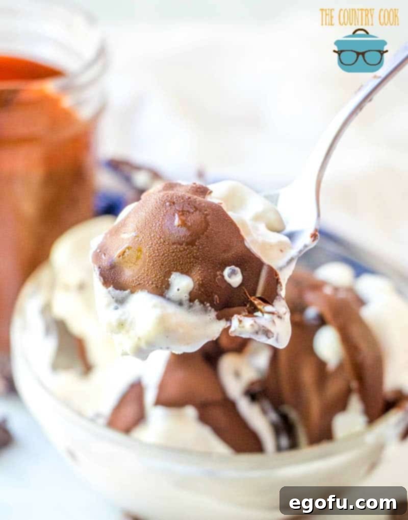 Magic Shell with Vanilla Ice Cream shown on a serving spoon