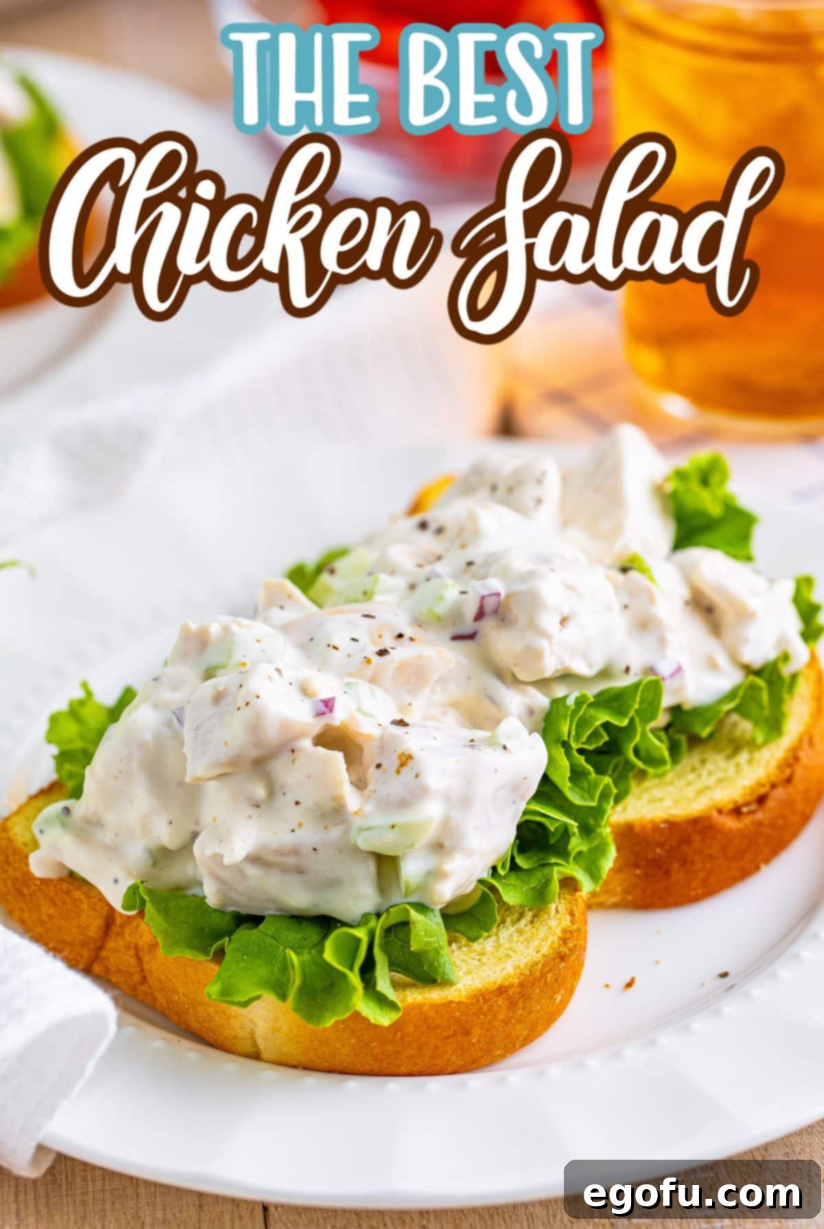 An open faced Chicken Salad sandwich on a plate.