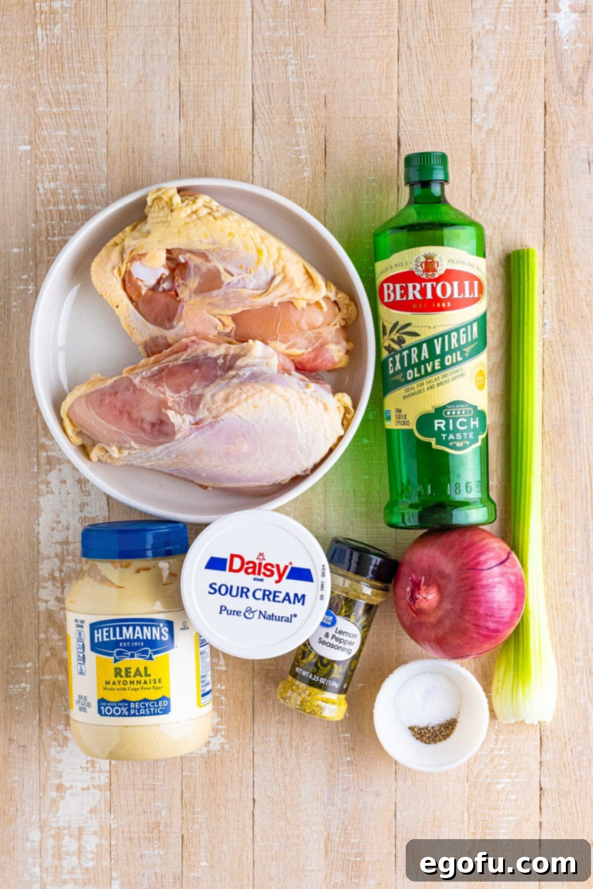 Olive oil, bone in skin on chicken breasts, sour cream, mayo, red onion, celery, salt pepper, and lemon pepper seasoning.