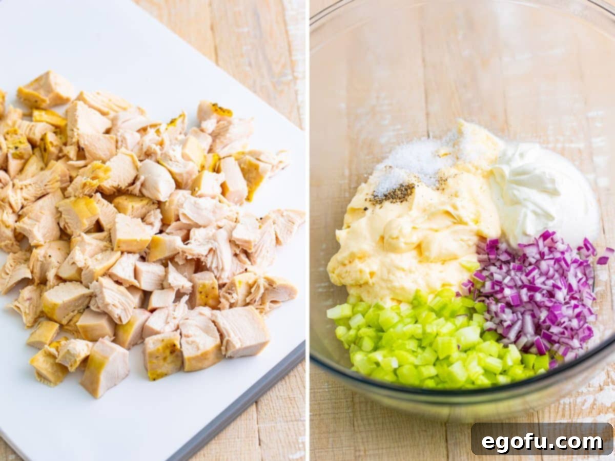 Diced cooked chicken breast on a cutting board and a bowl with ingredients for Chicken Salad. 