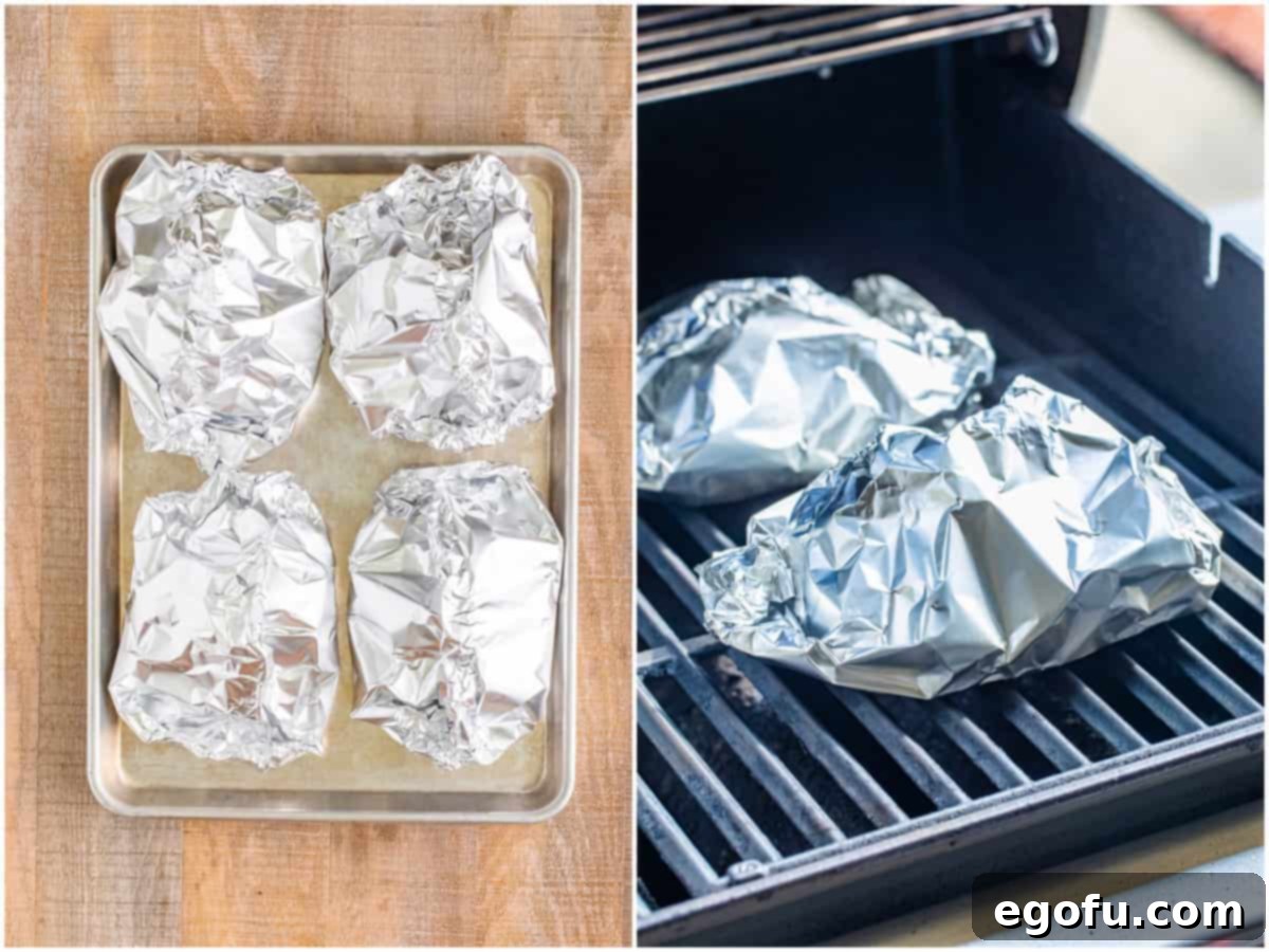Four foil packets sealed and ready for grilling.