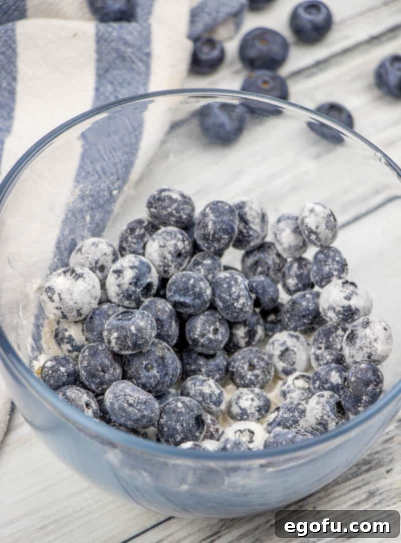 blueberries tossed together with all purpose flour.