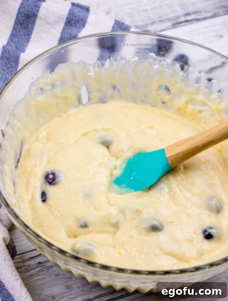 blueberries added to lemon loaf cake batter.