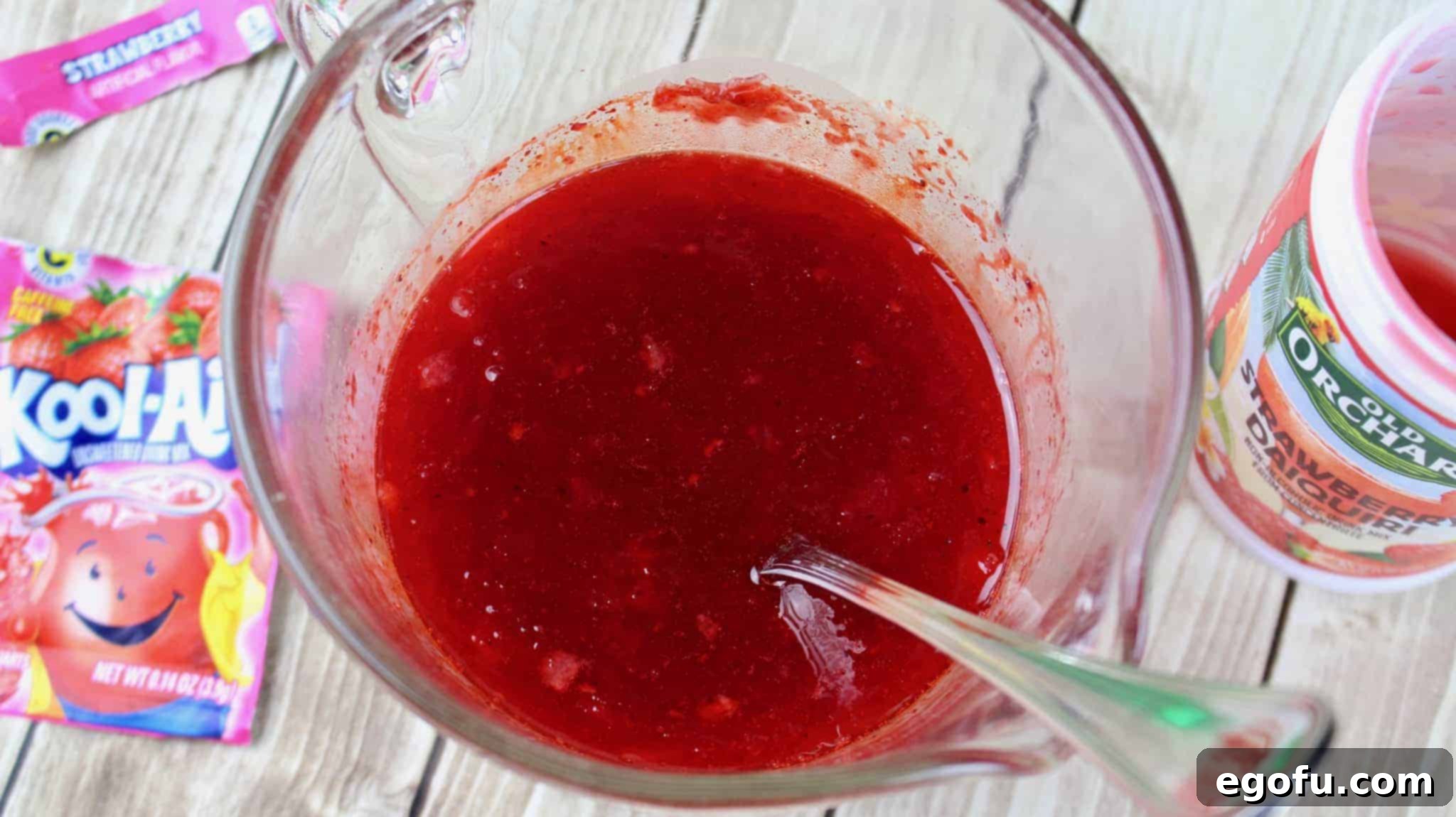 Effervescent Strawberry Bliss 5 mixing strawberry daiquiri concentrate with kool aid packet.