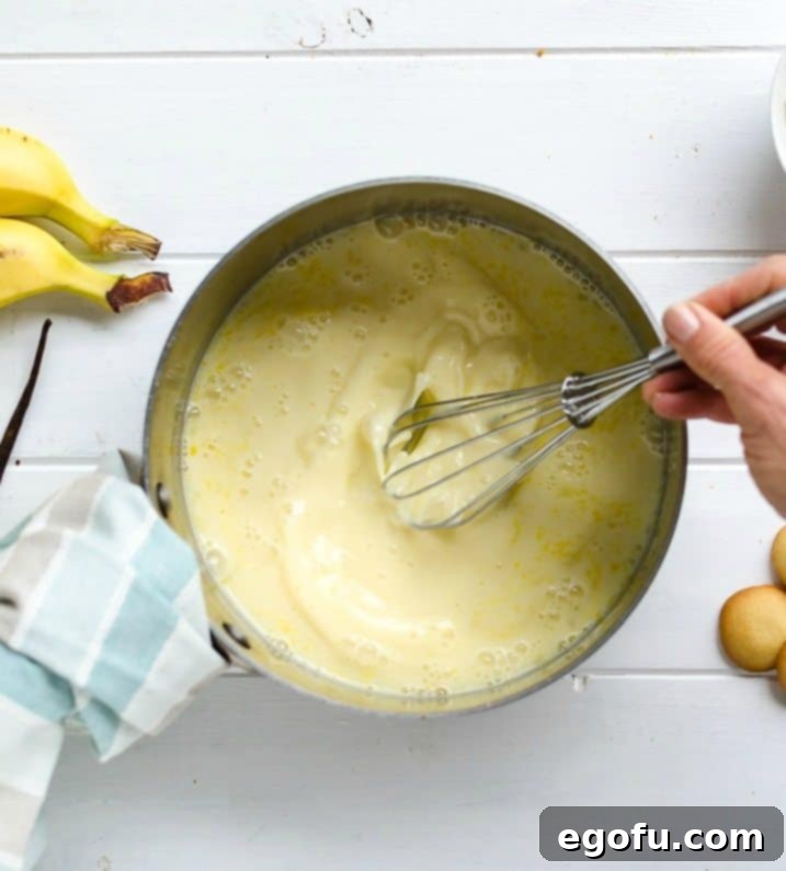 Velvet Banana Pudding Perfection 5 making custard with eggs, sugar and milk
