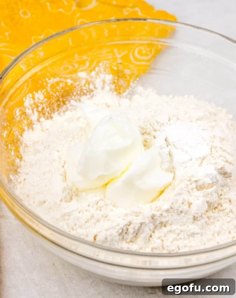 Soft Homemade Flour Tortillas 4 vegetable shortening, flour, baking powder, salt in a bowl, showing the initial ingredients for the tortilla dough.