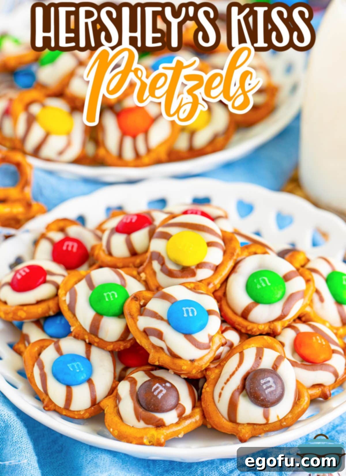 A plate with Hershey Kiss Pretzels ready to be served for dessert, highlighting their colorful appeal.